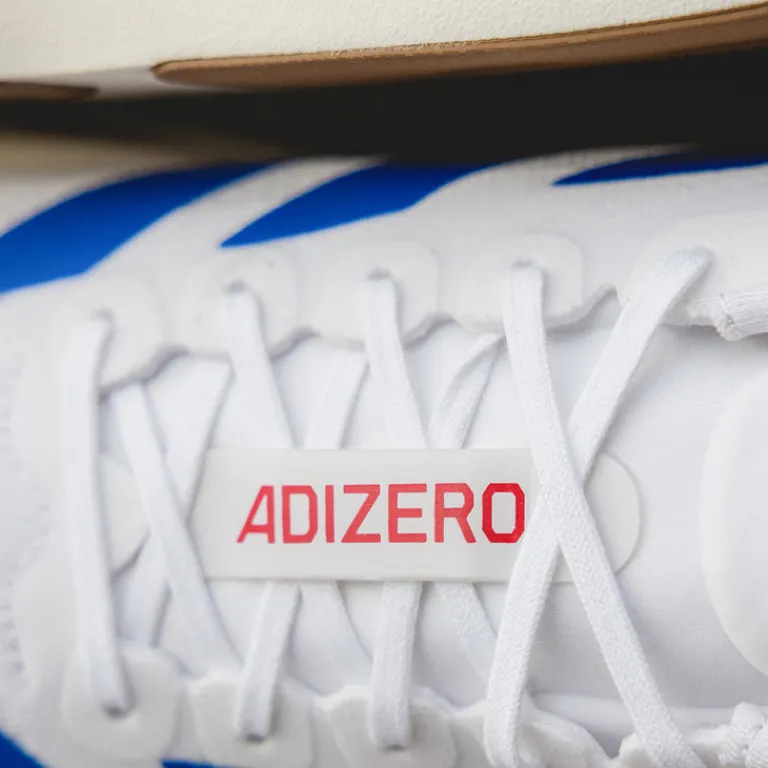 Vegane Sneaker|Laufschuhe*Adidas adizero Evo SL M Footwear White / Royal Blue / Pure Ruby