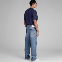 Hosen*Axel Arigato Patchwork Relaxed Jeans Light Blue