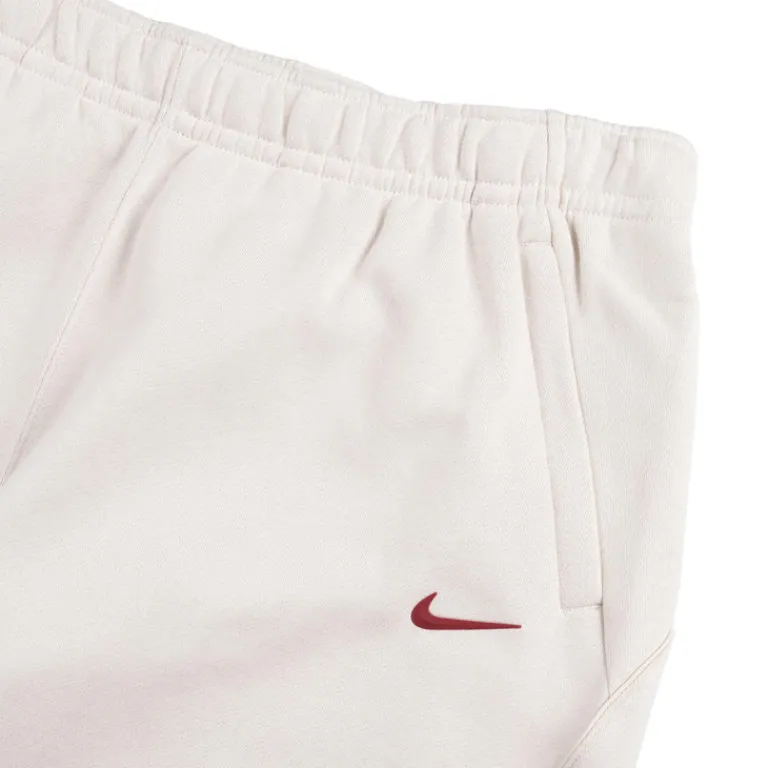 Jogginghosen*Nike x Nocta CS Open Hem Fleece Pant Light Orewood Brown / Team Red