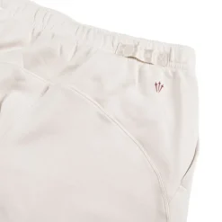 Jogginghosen*Nike x Nocta CS Open Hem Fleece Pant Light Orewood Brown / Team Red